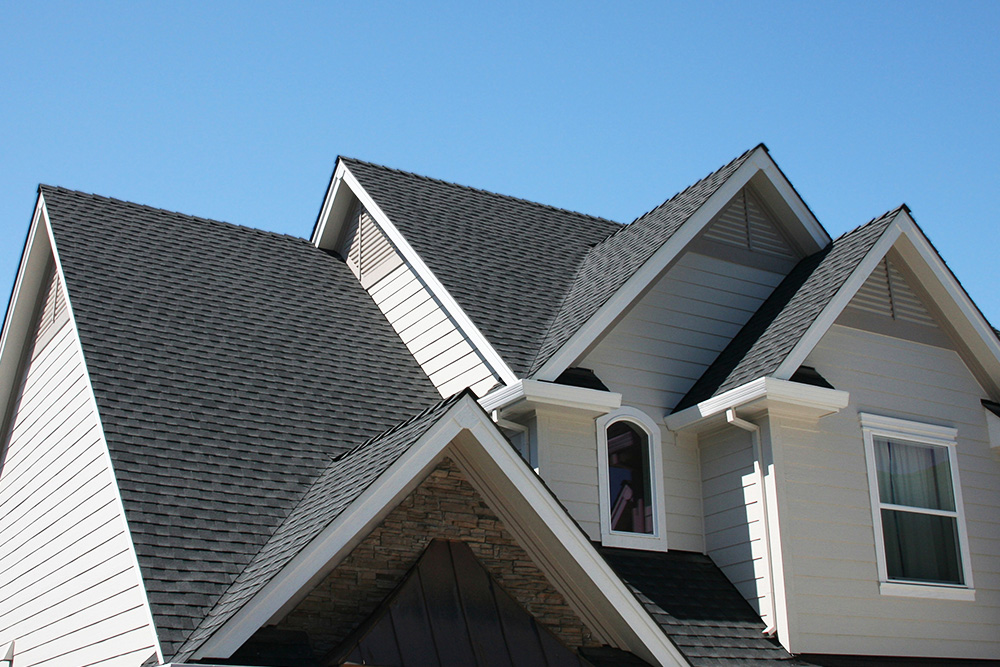 A house with new roof shingles